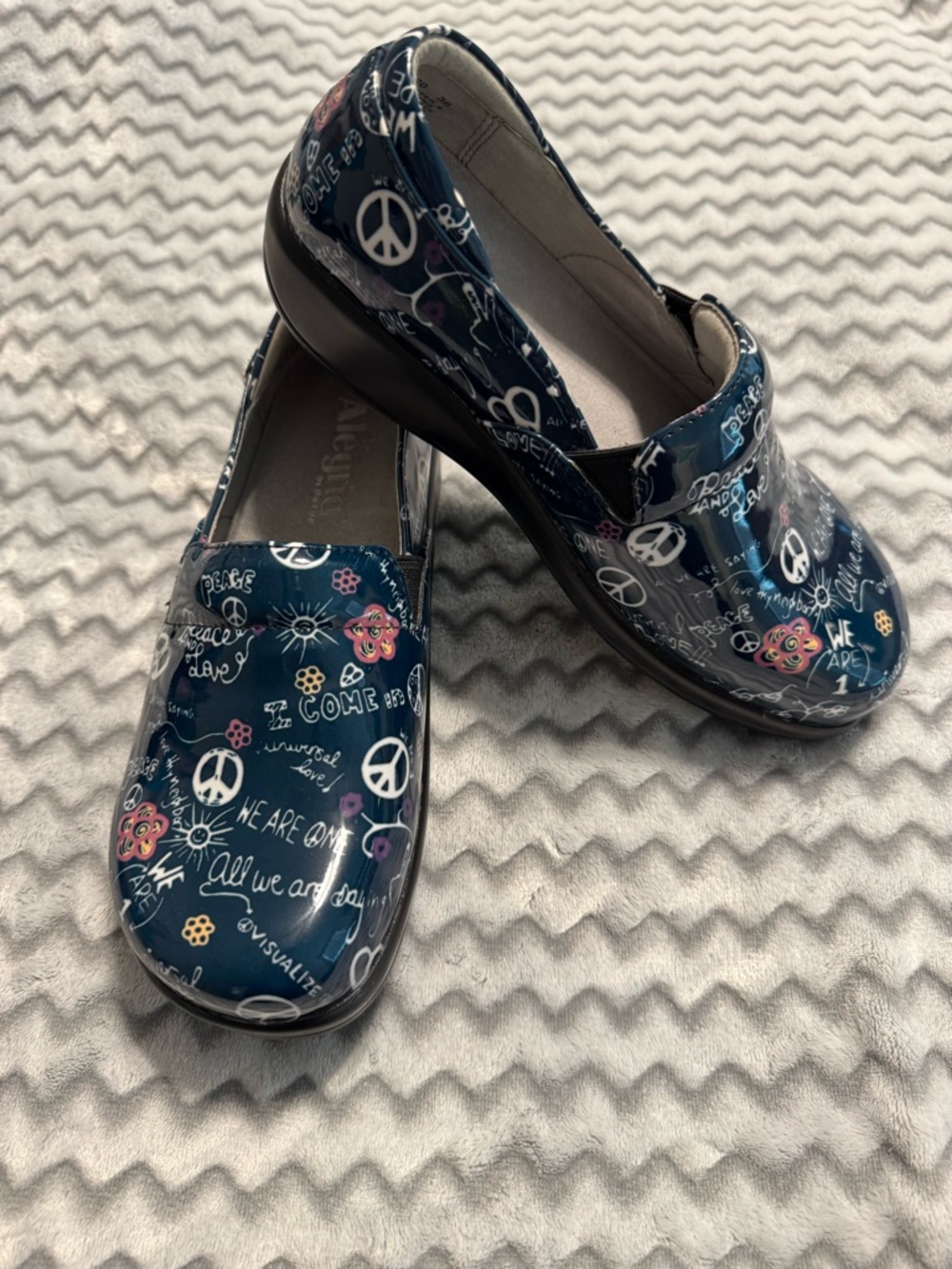 Alegria Women’s Navy Slip-On Shoes with Peace & Floral Graphics